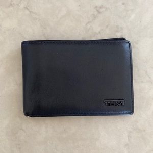 Tumi bifold black leather wallet